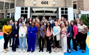 Group of interns outside Children's Hospital of the King's Daughters