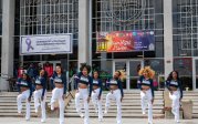 A group of students perform a dance routine.