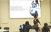 	Speaker Ameirha Corbin asking questions at the Symposium