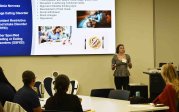 Claire Donohue, Senior Recreational Therapy student speaks at the symposium