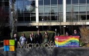 ODU class on Microsoft campus standing behind logo with class banner.