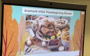 picture of a projector with "aramark visa thanksgiving"
