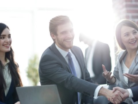 Successful partnership in business displayed by shaking hand