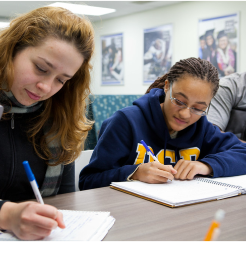 3 students write and study in the STC
