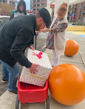 Photo of toys being delivered to Children's Hospital of the King's Daughters. 