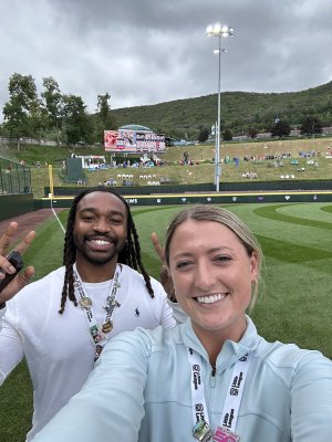 Two people pose for a selfie.