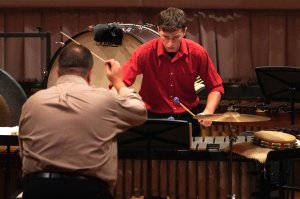 David Walker, foreground, directs the Old Dominion University Percussion Ensemble, including his son Michael Walker.