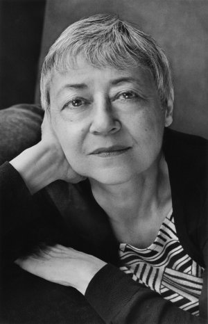 Black and white headshot of a woman.