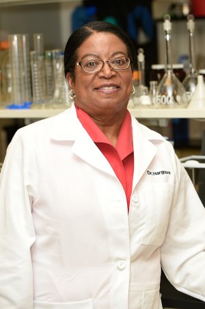 Dr. Barbara Hargrave in white lab coat