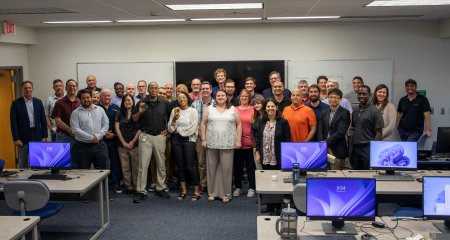 Group of men and women in a computer lab