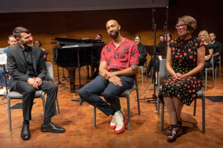 Loving v. Virginia" conductor&nbsp;Adam Turner, ODU alumnus and composer Damien Geter ’02&nbsp;and librettist Jessica Murphy Moo sit on a stage. 