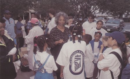 A photo of Cee Cee Tucker and students at a youth program.