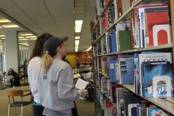 Perry Library Students In Stacks