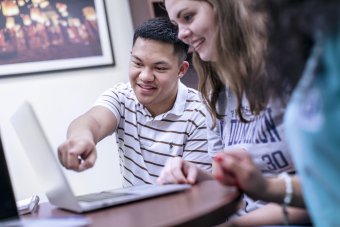 Students working at a computer