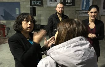 Yuping Liu-Thompkins, left, talks with audience members afte