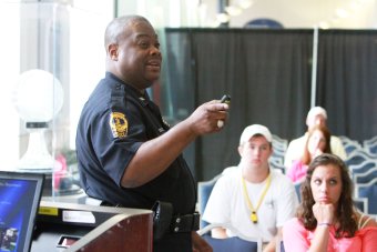 Officer presents wellness and safety at New Student Orientat