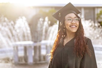 Graduate at fountain
